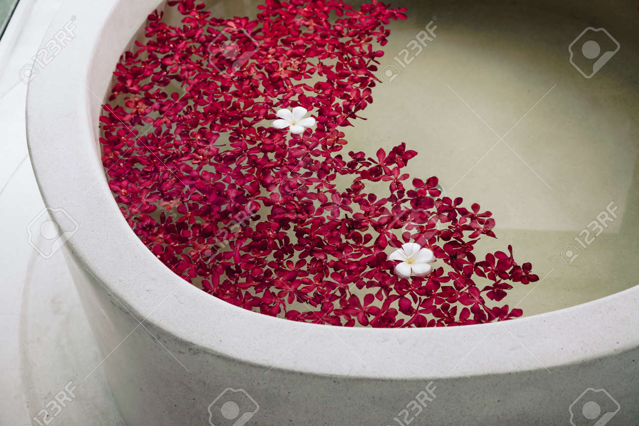 luxury hotel bath with tropical flowers, spa decoration stock luxury hotel bath with tropical flowers, spa decoration stock