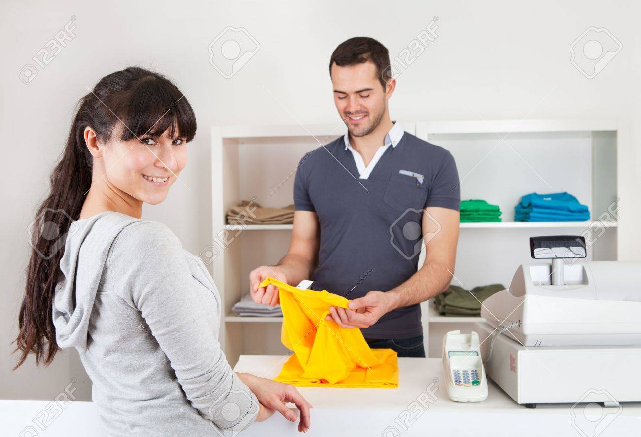 Portrait Of Female Cashier At Clothing Store