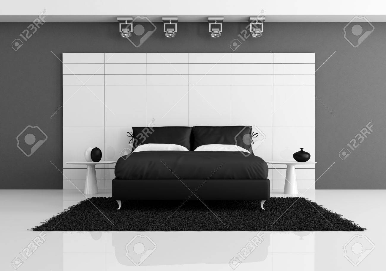 Noir et blanc chambre à coucher avec un lit double contre le ...