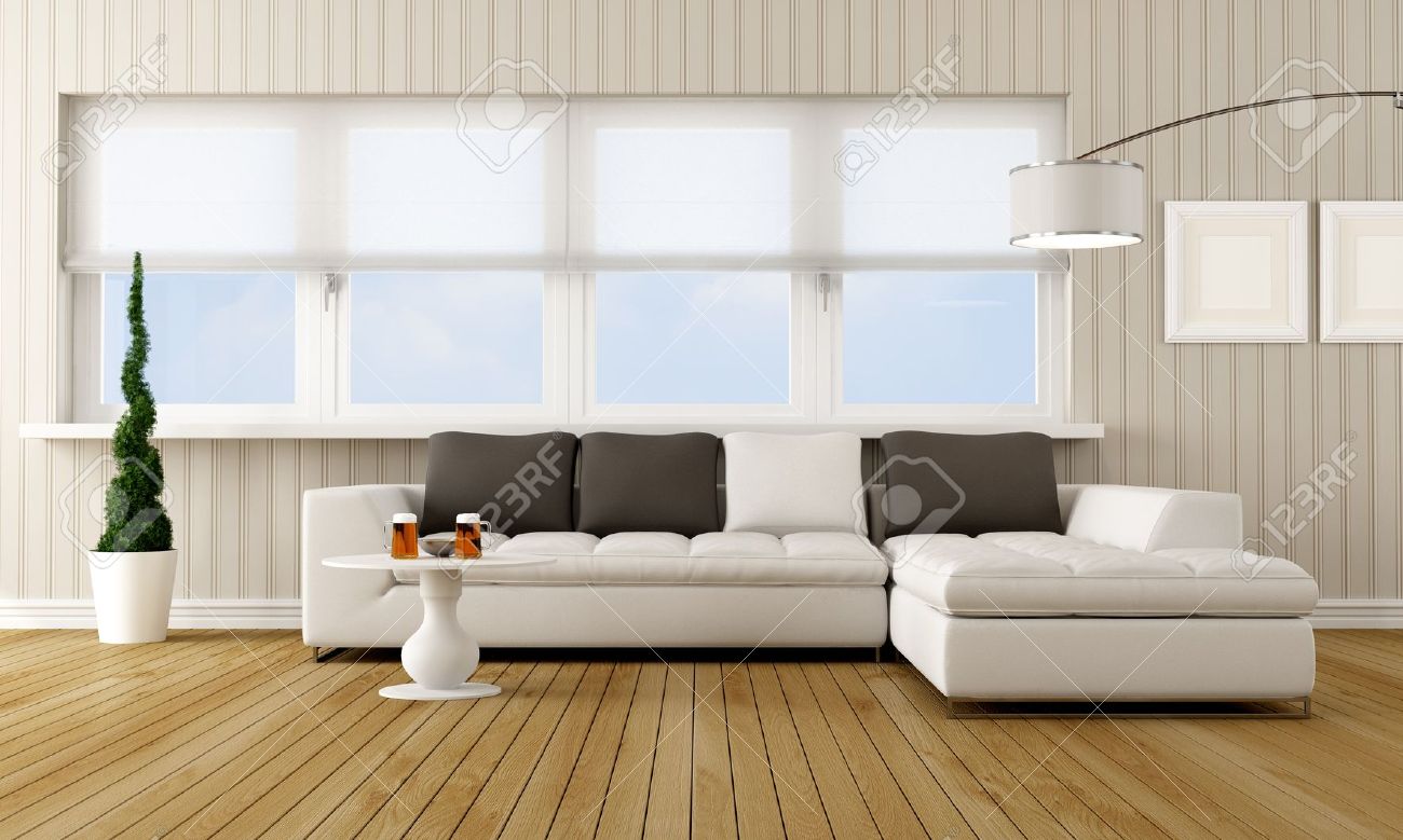 Moderne woonkamer met hoekbank in de voorkant van een groot raam ...