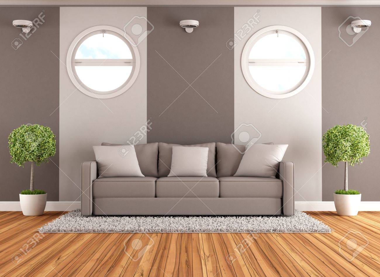 Hedendaagse woonkamer met bruine bank en ronde ramen rendering ...
