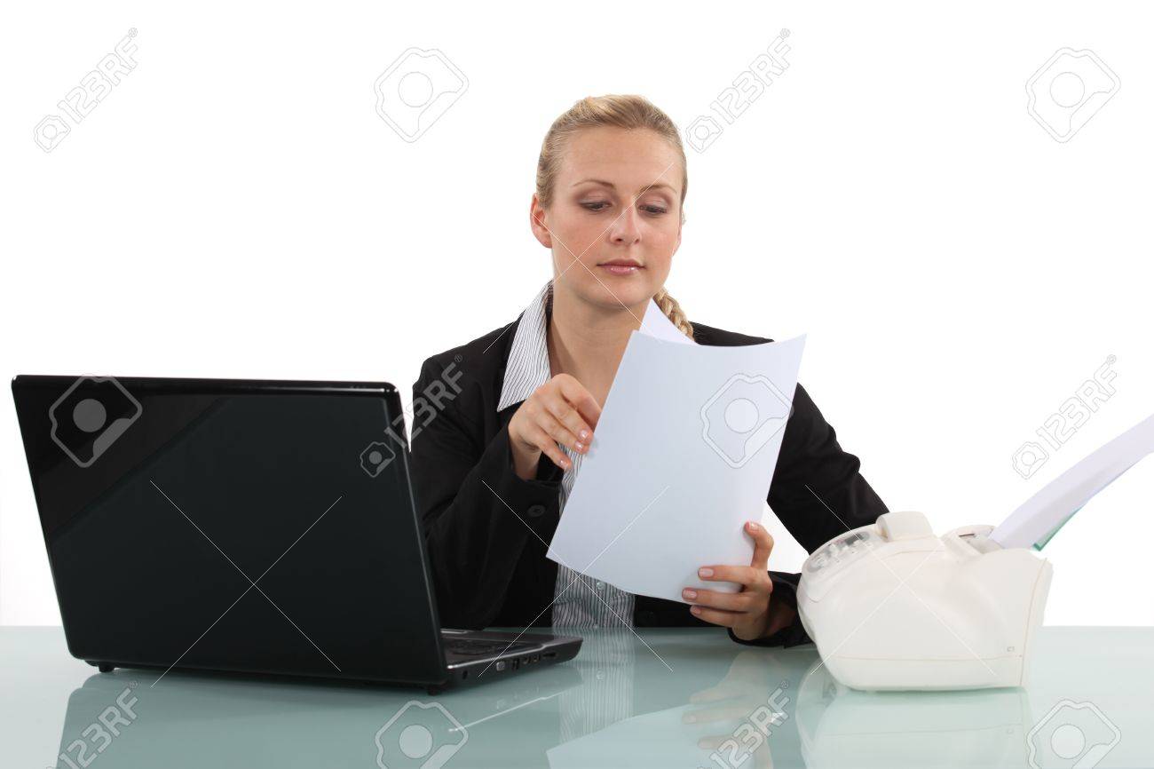 clerical worker flipping through a document stock photo picture clerical worker flipping through a document stock photo picture