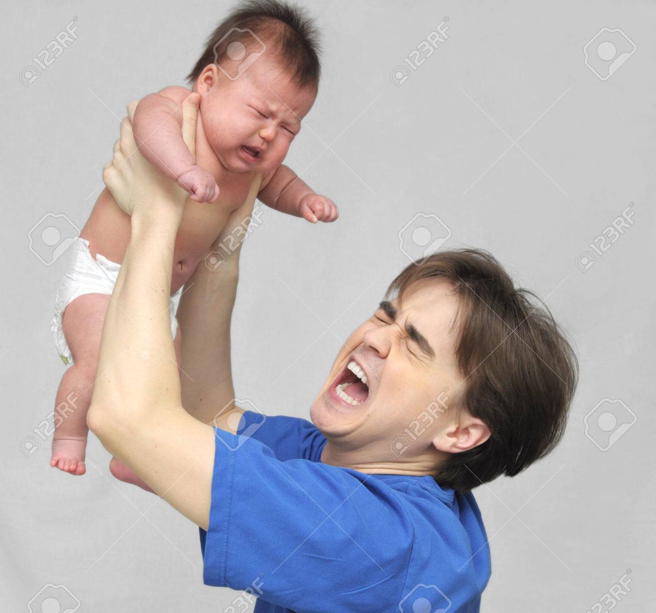 http://previews.123rf.com/images/aykuli/aykuli1403/aykuli140300137/26659929-White-caucasian-man-screaming-holds-his-crying-child-Stock-Photo.jpg