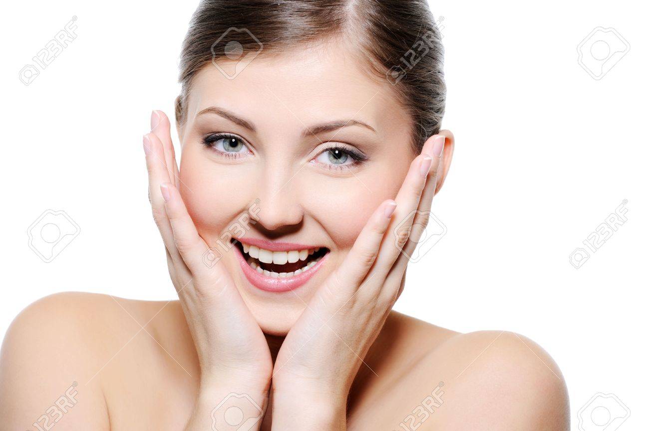 5721747-Portrait-of-a-young-happy-female-with-the-hands-at-her-clean-clear-face-Stock-Photo.jpg