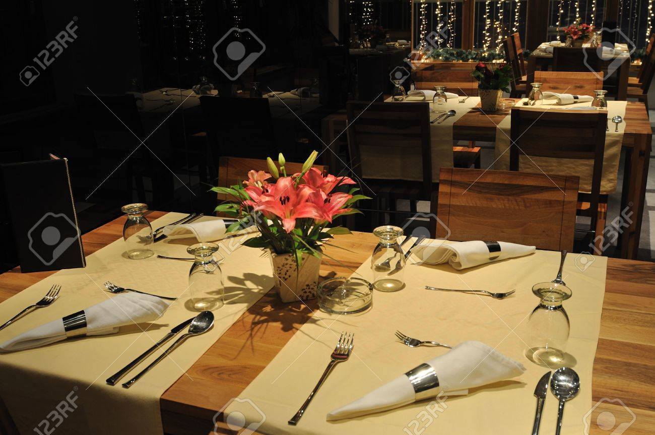 Luxury Modern Indoor Restaurant With Wooden Chairs And Tables Luxury Modern Indoor Restaurant With Wooden Chairs And Tables