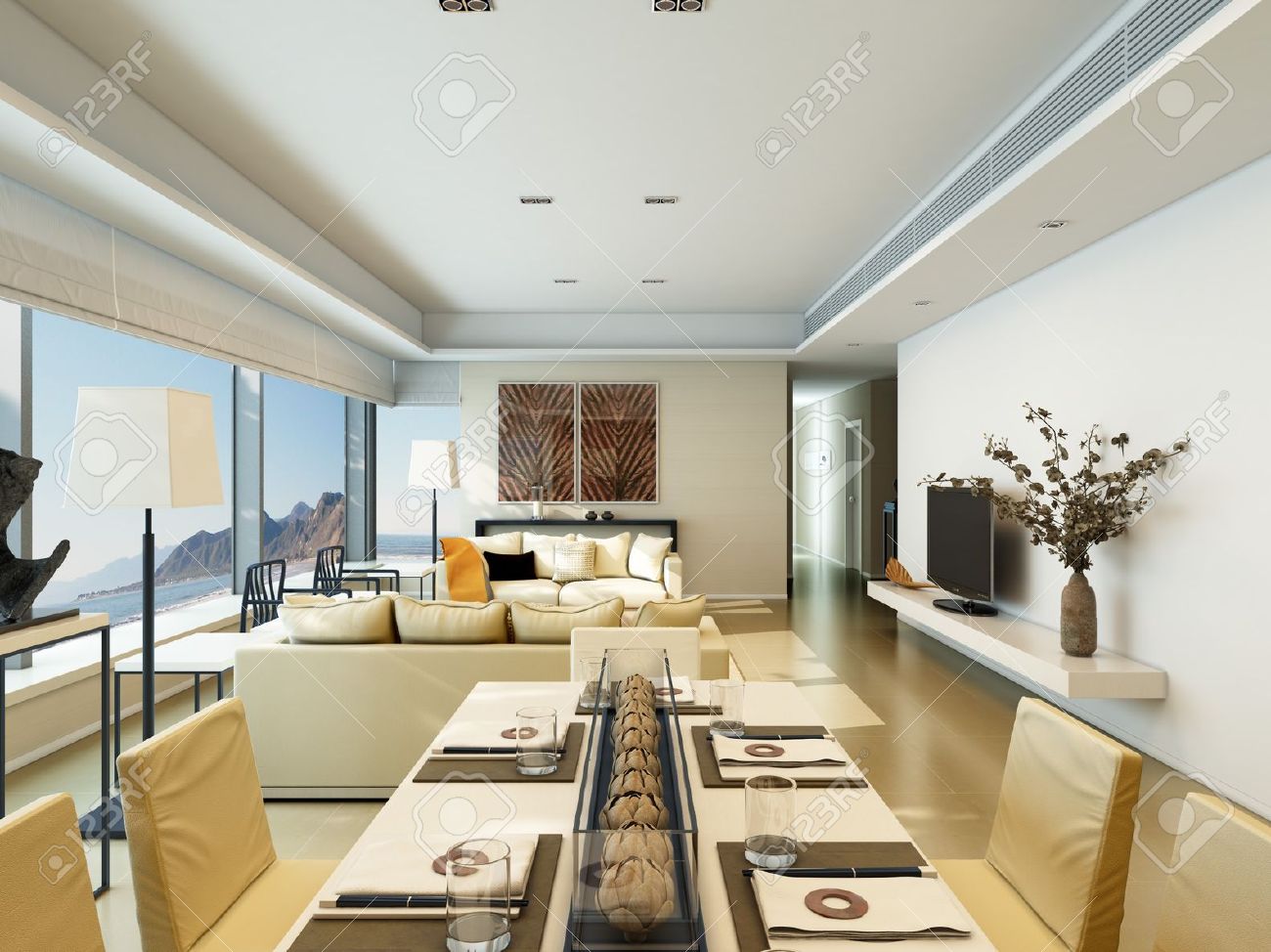 Interieur van een modern huis met een woonkamer en eetkamer aan de ...