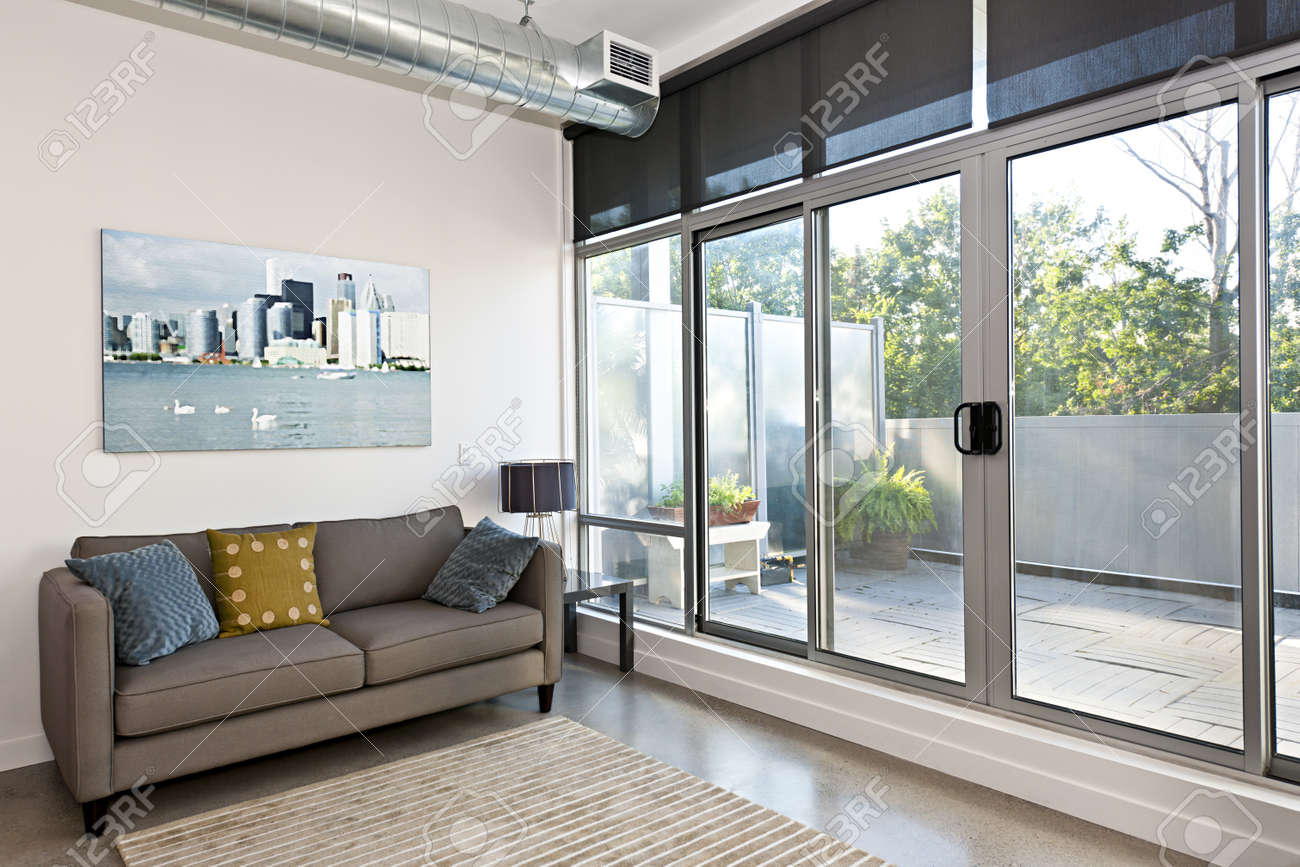 Living Room With Sliding Glass Door To Balcony - Artwork From Living Room With Sliding Glass Door To Balcony - Artwork From