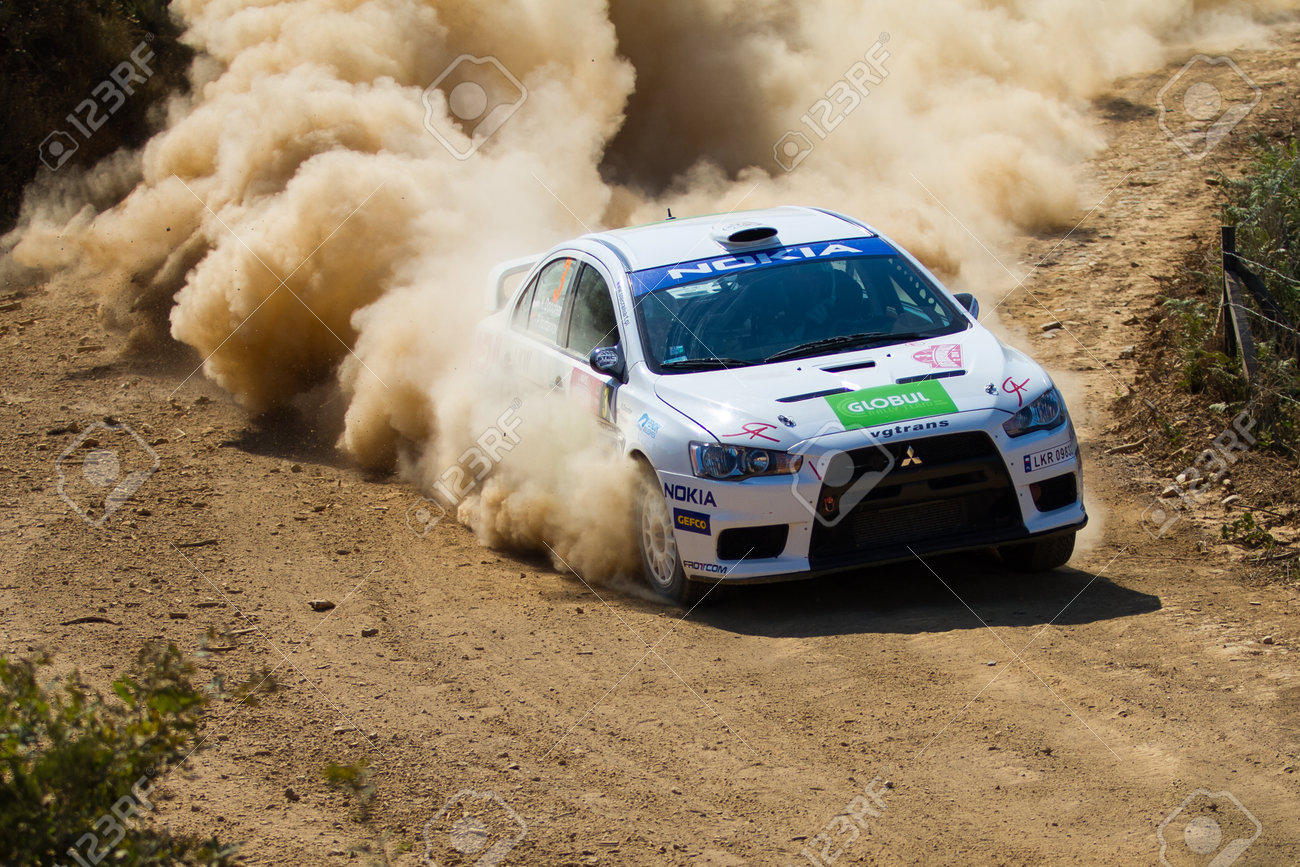 32243419-ISTANBUL-TURKEY-AUGUST-16-2014-Krum-Donchev-drives-Mitsubishi-Lancer-Evo-X-car-of-Global-Rally-Team--Stock-Photo.jpg