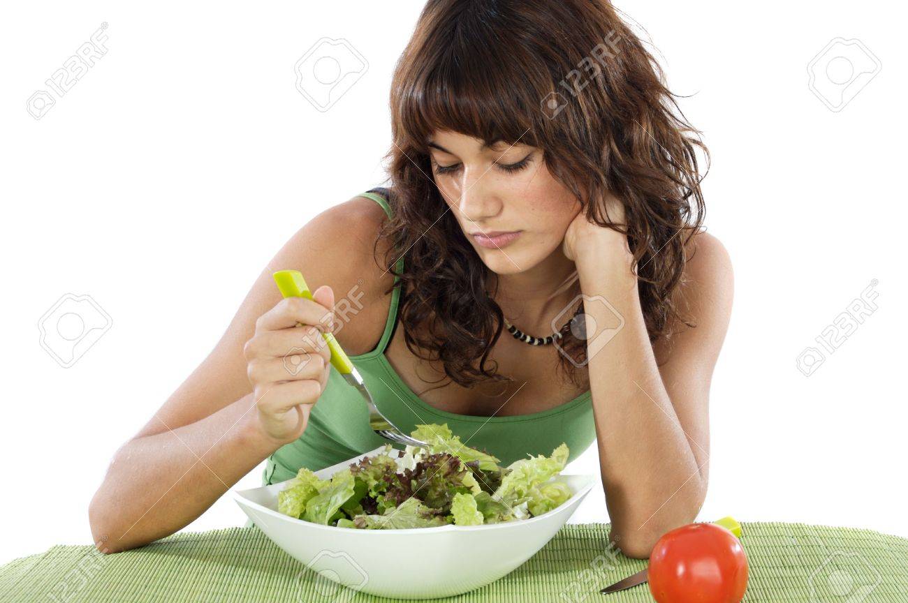3548341-A-sad-teen-eating-salad-Care-his-diet--Stock-Photo-woman.jpg