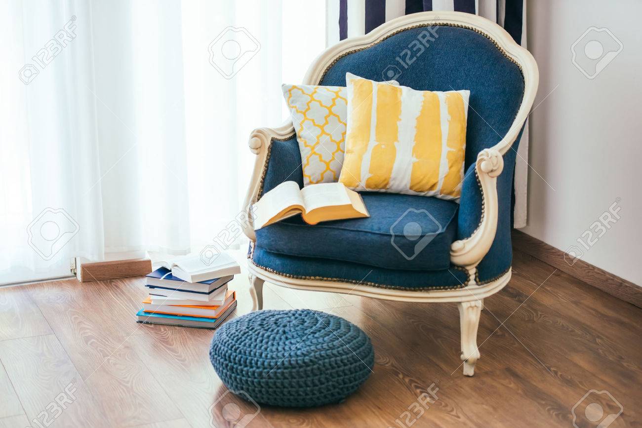 home decor cozy armchair with open book and decorative pillows interior and home decor - Home Decor Photos Free home decor cozy armchair with open book and decorative pillows interior and home decor - Home Decor Photos Free