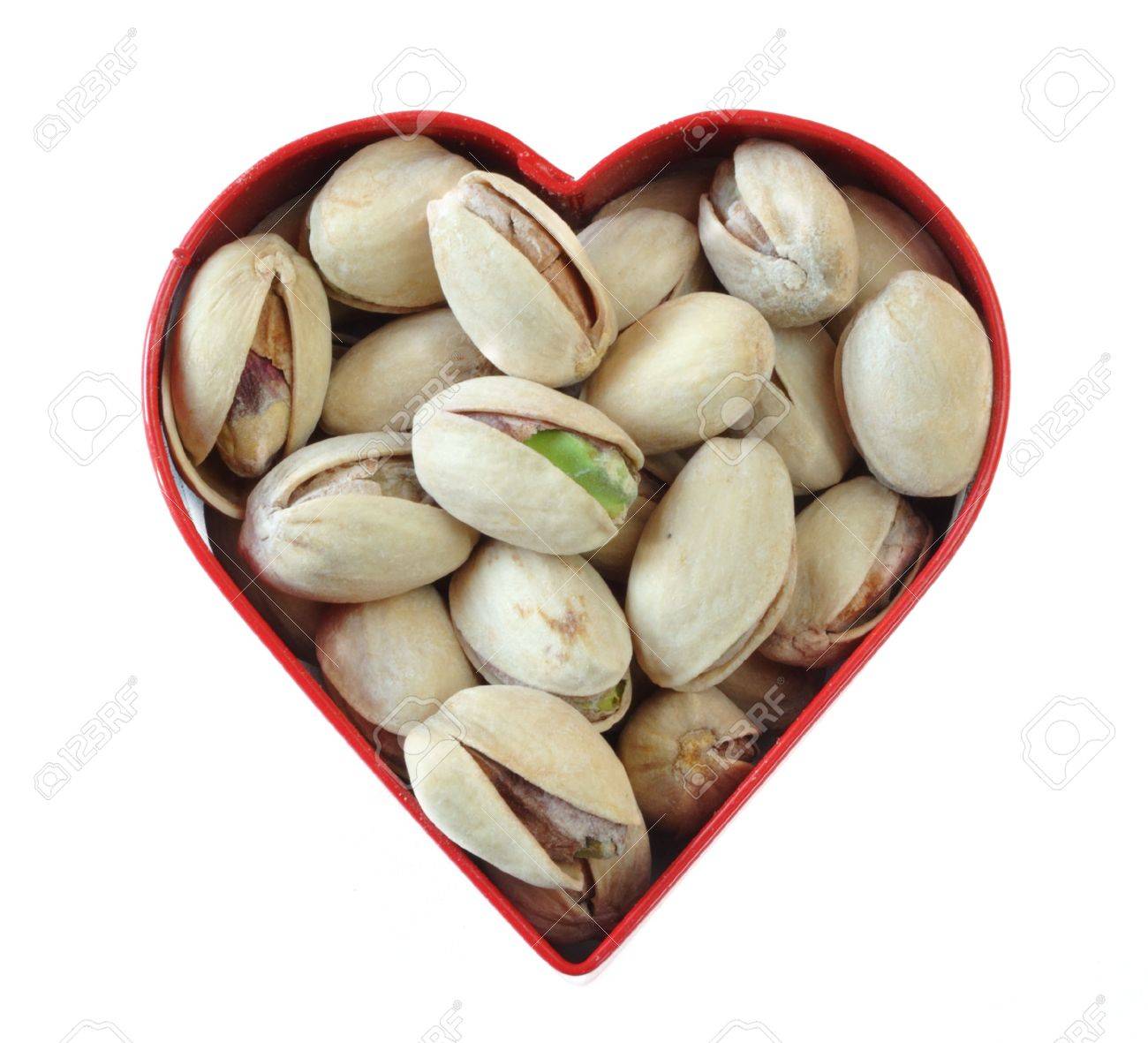 6341402-Pistachio-Nuts-in-Heart-Shaped-Cookie-Cutter-Stock-Photo.jpg