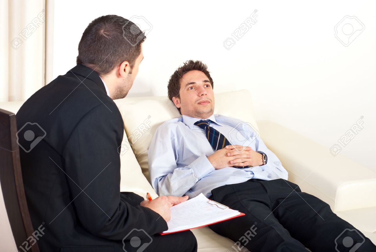 8902689-Psychiatrist-man-talking-with-hypnotized-male-patient--Stock-Photo.jpg