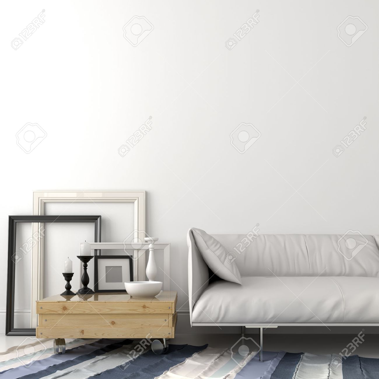 Moderne woonkamer met een leren bank en een salontafel in licht ...