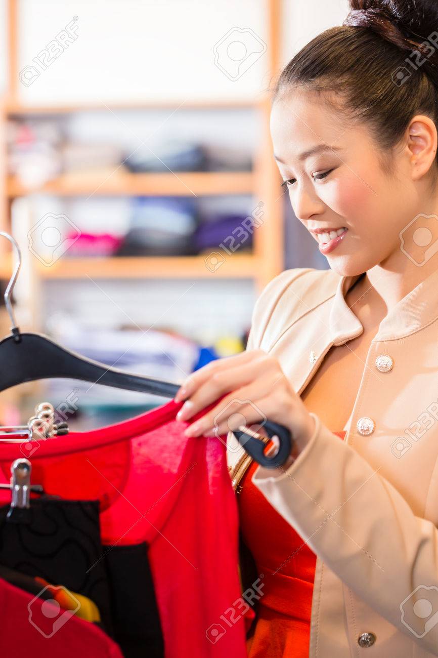 Shopper Woman Happy Shopping And Buying Clothes. Joyful Excited