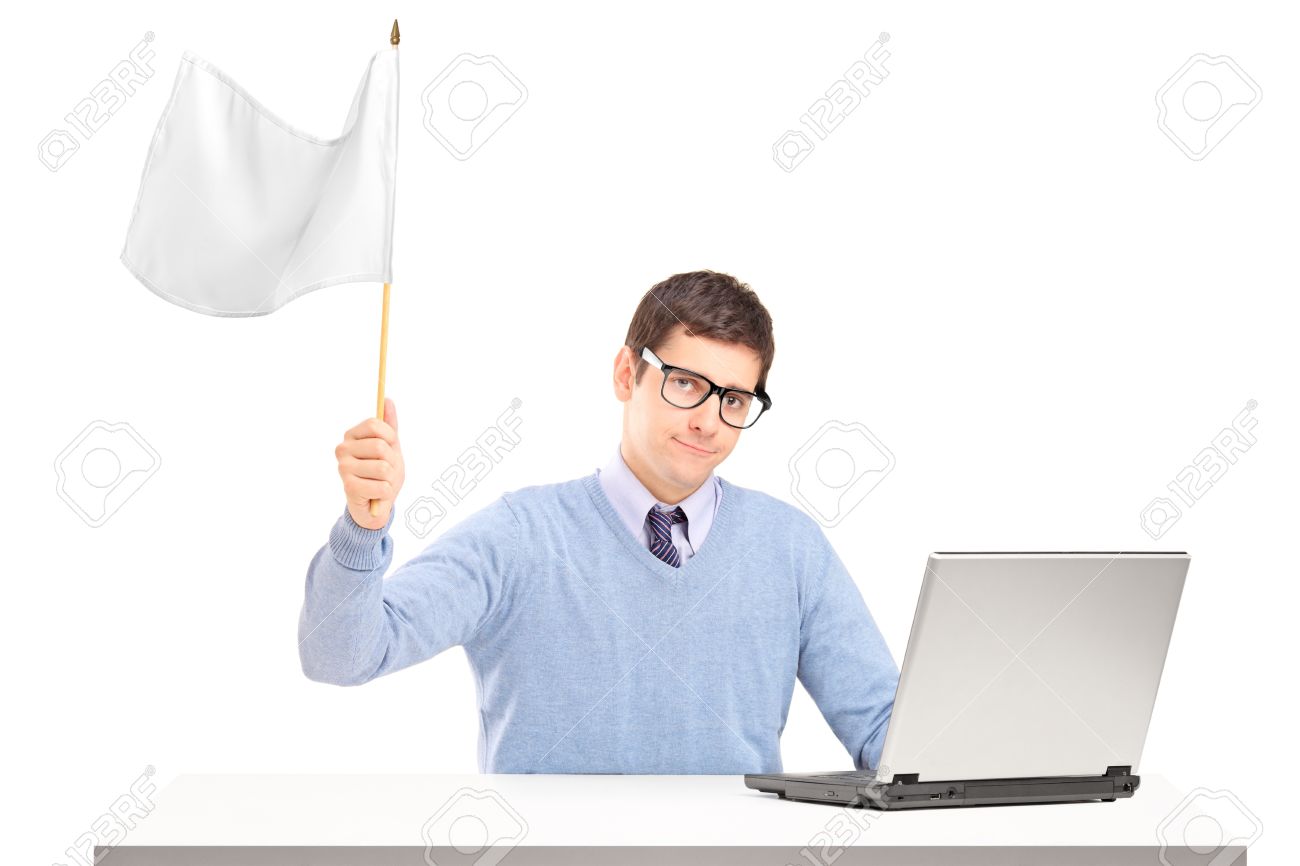15636924-Sad-man-sitting-with-laptop-and-holding-a-white-flag-gesturing-defeat-isolated-on-white-background-Stock-Photo.jpg