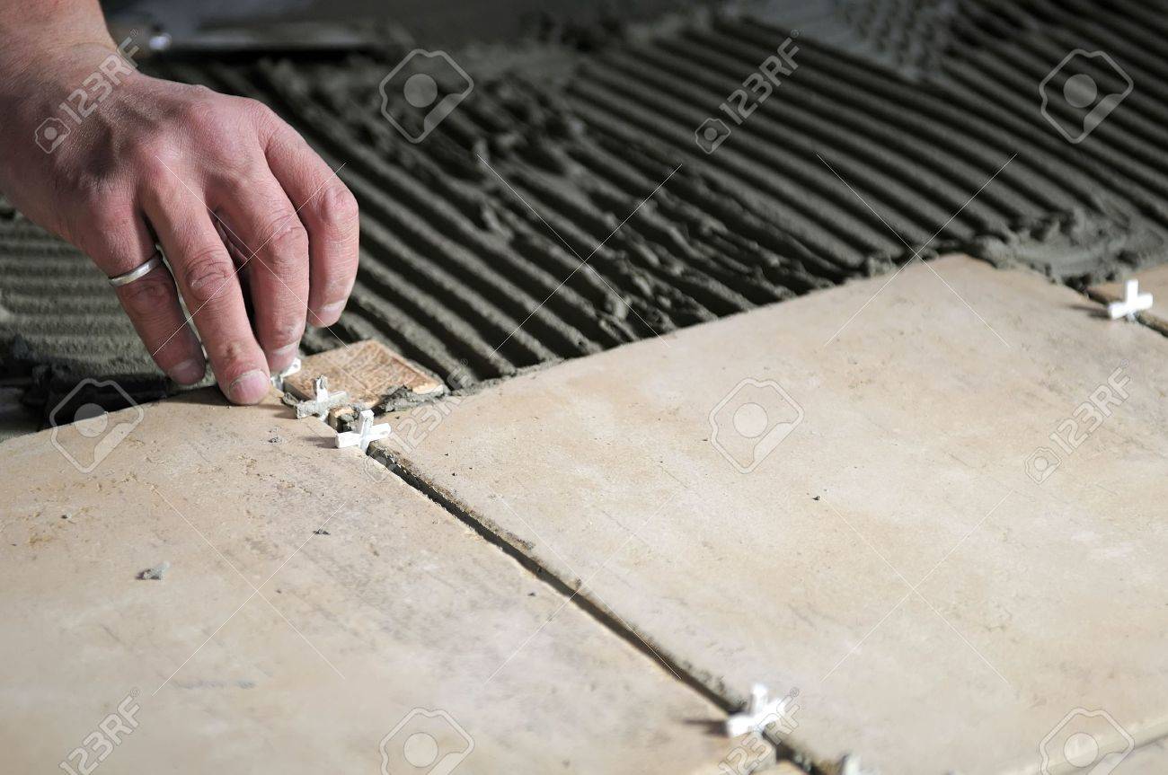 Tile Flooring Installation step 1 Details Of Tiles Installation On The Floor Stock Photo 6036736 Tile Flooring Installation details of tiles installation on the floor stock photo 6036736 Details Of Tiles Installation On The Floor Stock Photo 6036736