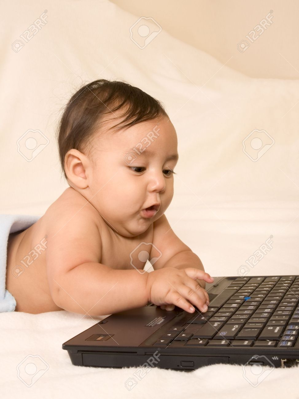 Worksheet Typing For Kid kid playing with notebook computer keyboard typing on it stock photo 3363017