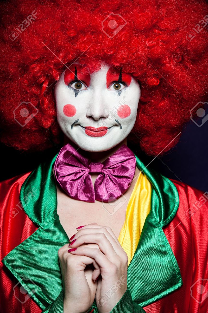 11095016-a-female-clown-with-colorful-clothes-and-makeup-Stock-Photo-clown-carnival-circus.jpg