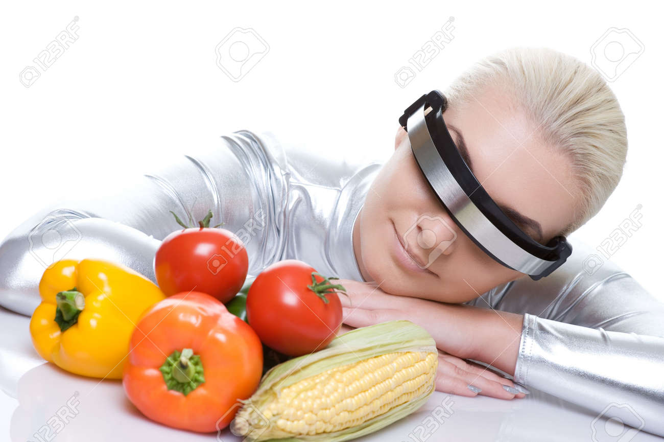 6088410-Attractive-cyber-woman-with-different-vegetables-Stock-Photo-corn.jpg