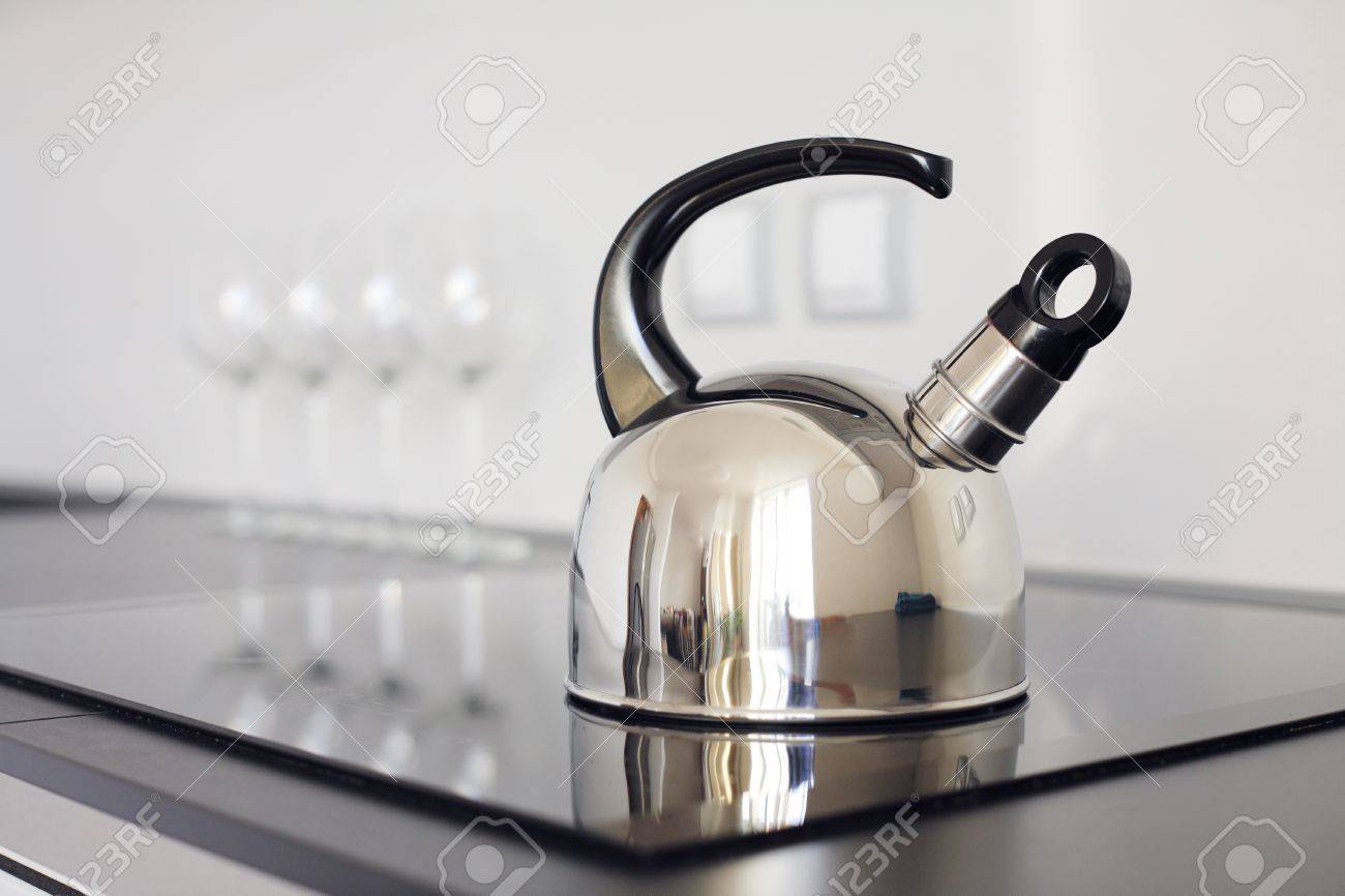 Modern Kettle On The Stove Stock Photo Picture And Royalty Free - Stock Photo Modern Kettle On The Stove modern kettle on the stove stock photo picture and royalty free - stock photo modern kettle on the stove