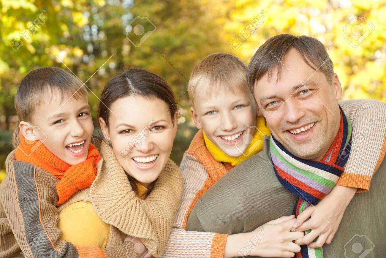 Living Room Family Of Four Picture Ideas happy family of four on the nature stock photo picture and nature