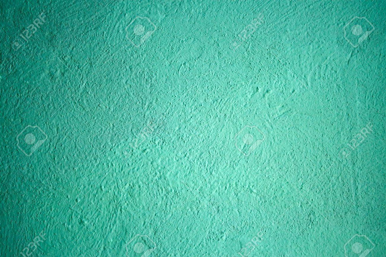 Fragment van geschilderde gepleisterde muren met turquoise tinten ... Muur kleur turquoise