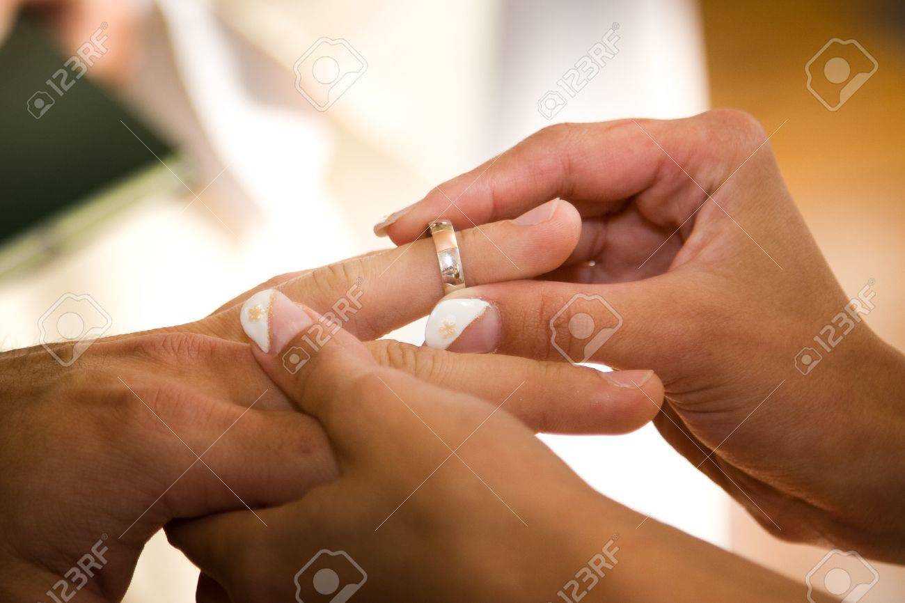 Groom wedding ring finger