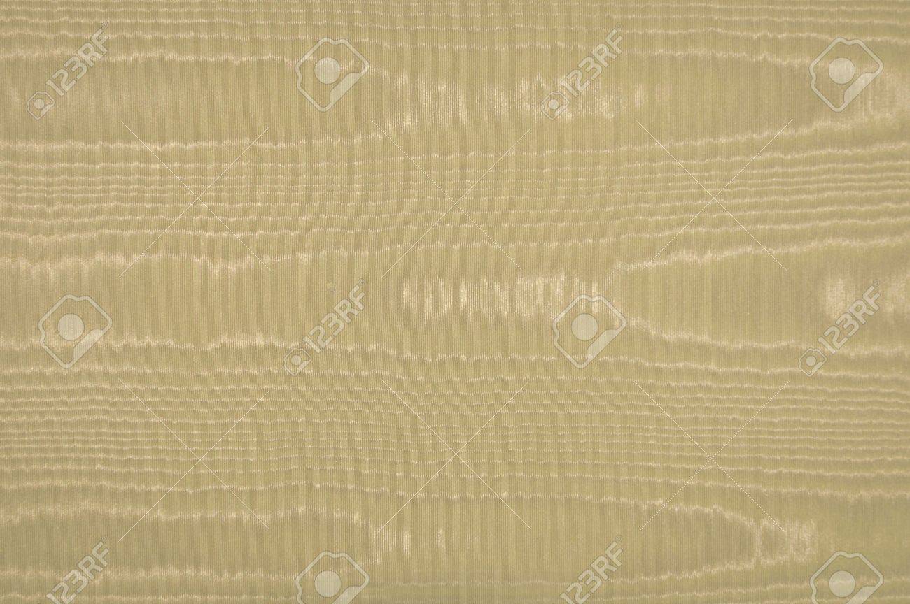 Moire weefsel in beige, bruin, of khaki dat lijkt op water ...