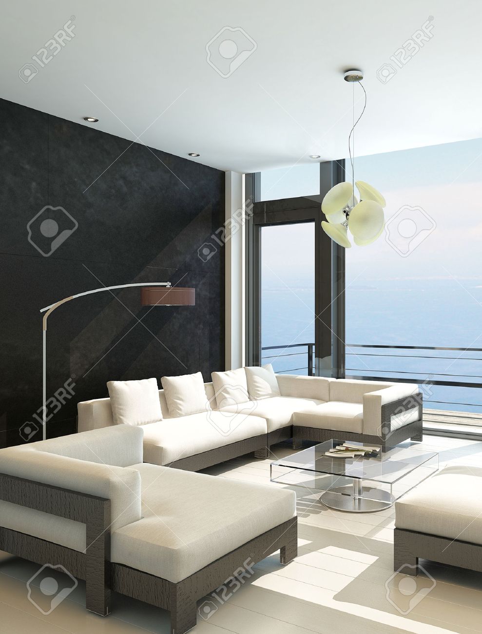 Moderne woonkamer met grote ramen en zwarte stenen muur royalty ...