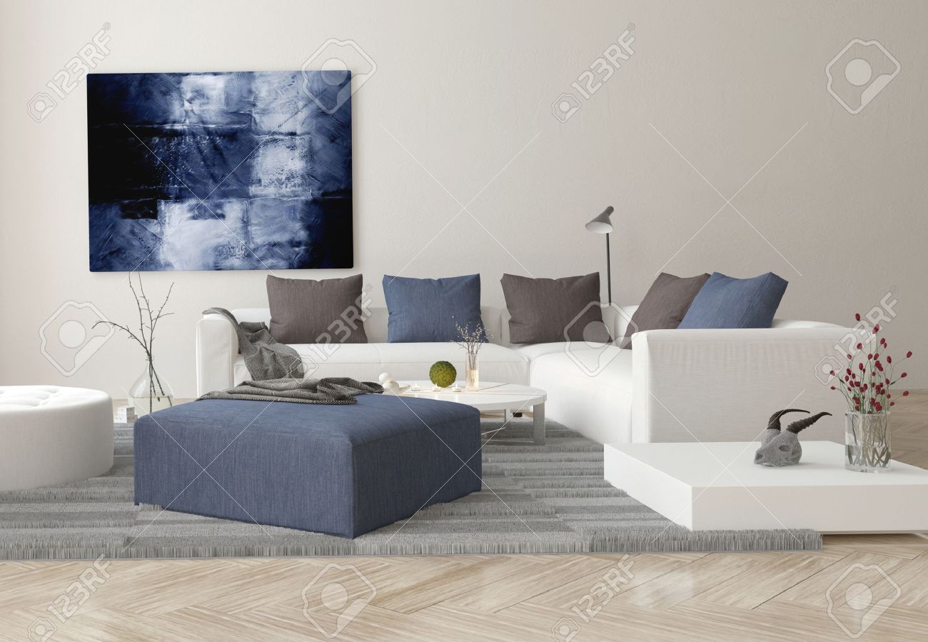 Interieur van de moderne woonkamer met sofa, ottomaanse en artwork ...