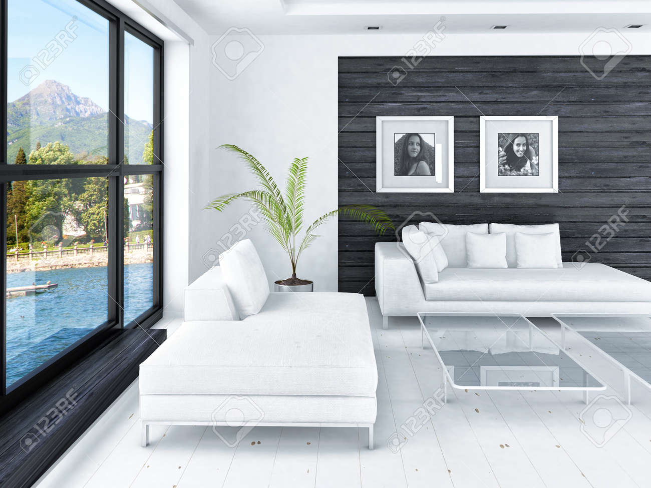Moderne woonkamer met grote ramen en zwarte houten wand royalty ...
