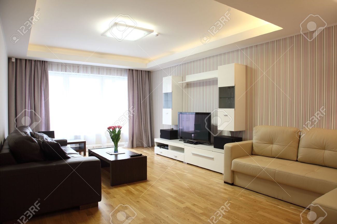 Photo ein modernes wohnzimmer in einer neuen wohnung mit moderner beleuchtung