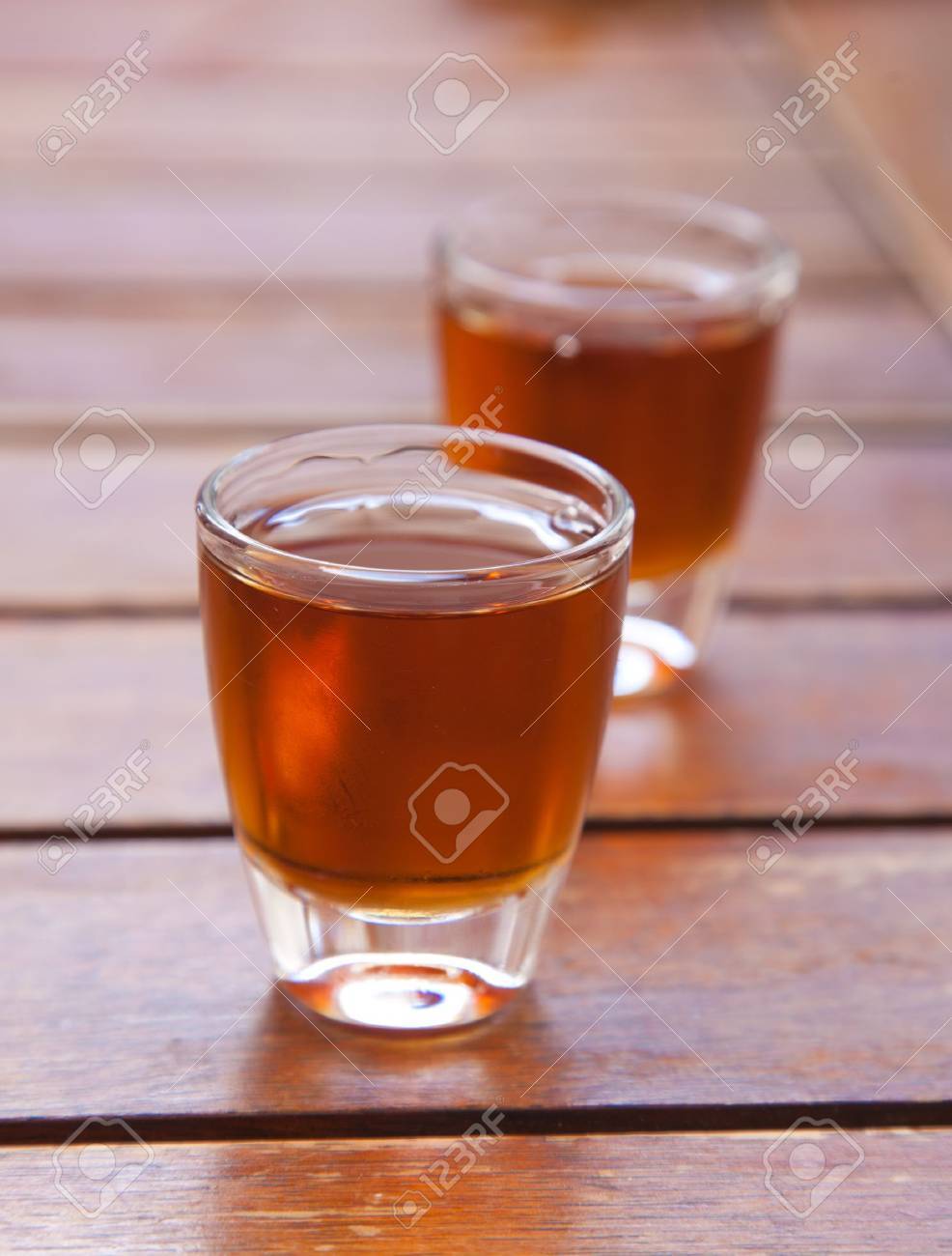 13454748-two-small-glasses-of-cold-honey