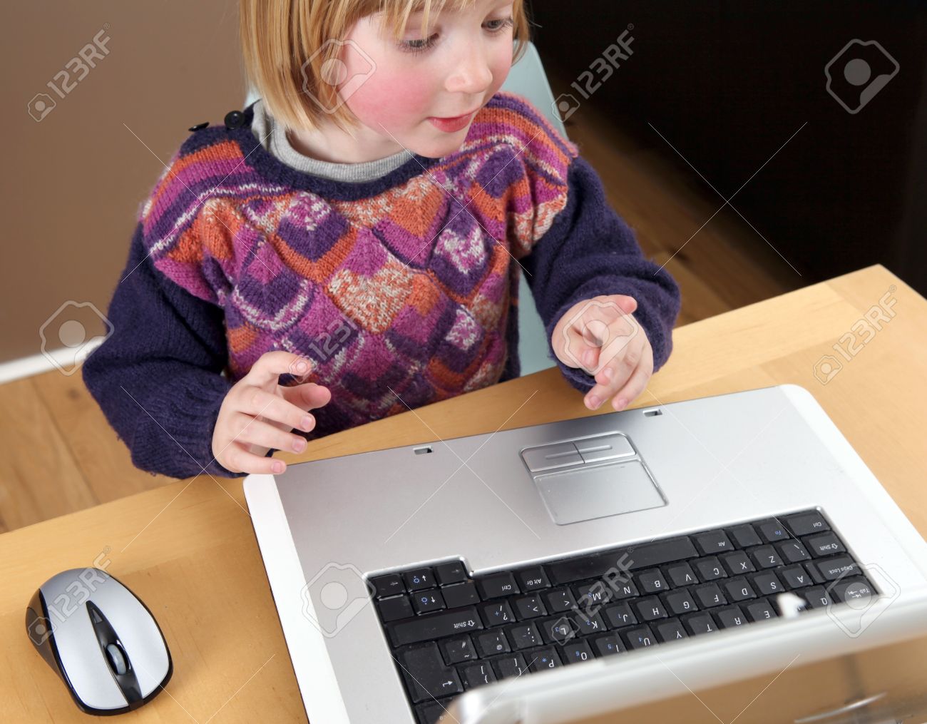 Worksheet Typing For Kid child playing with computer blonde boy typing or working on laptop keyboard kid concentrating