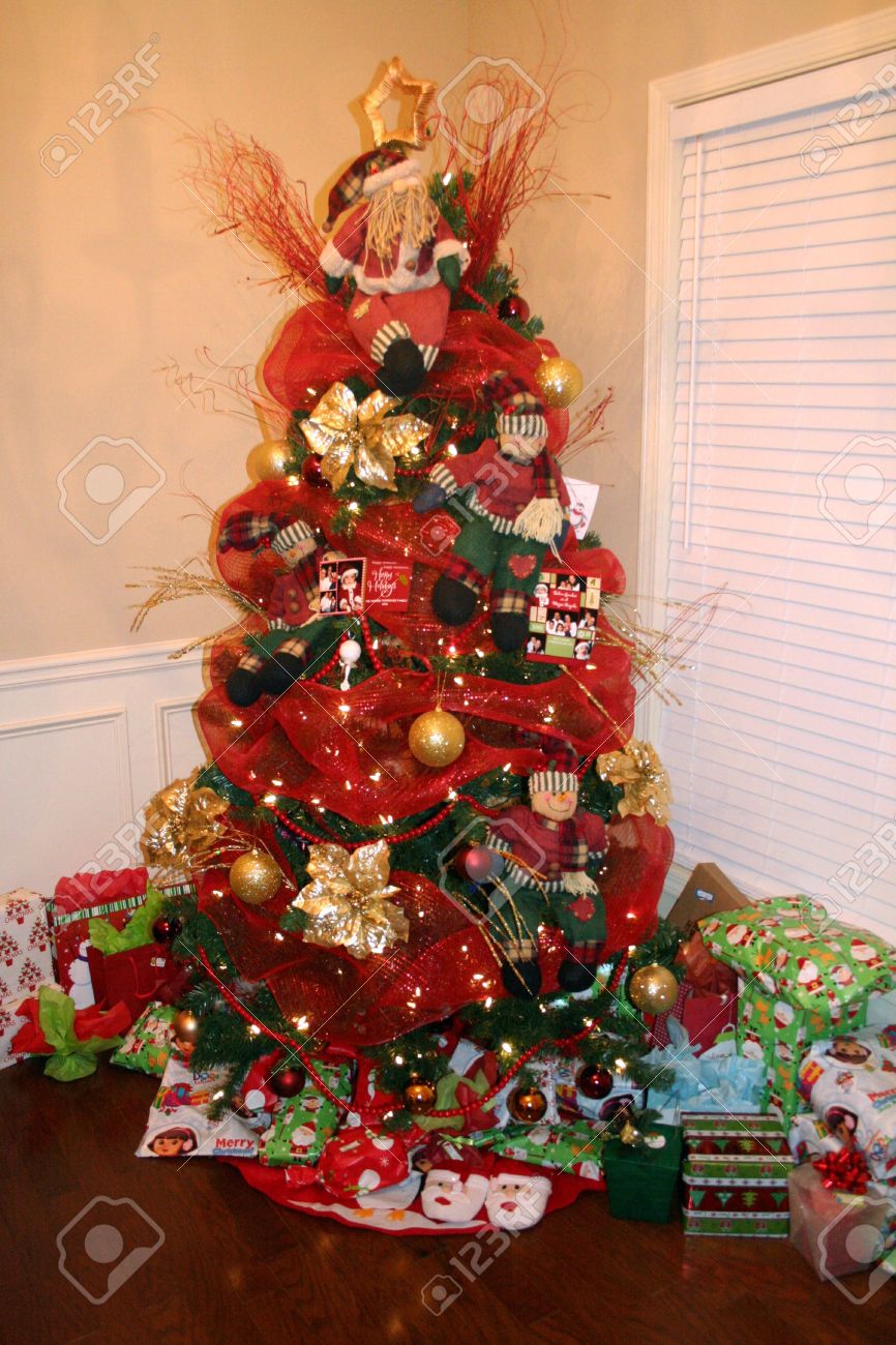 stock photo christmas tree decorated with red and gold ornaments - Red And Gold Christmas Tree Decorations stock photo christmas tree decorated with red and gold ornaments - Red And Gold Christmas Tree Decorations