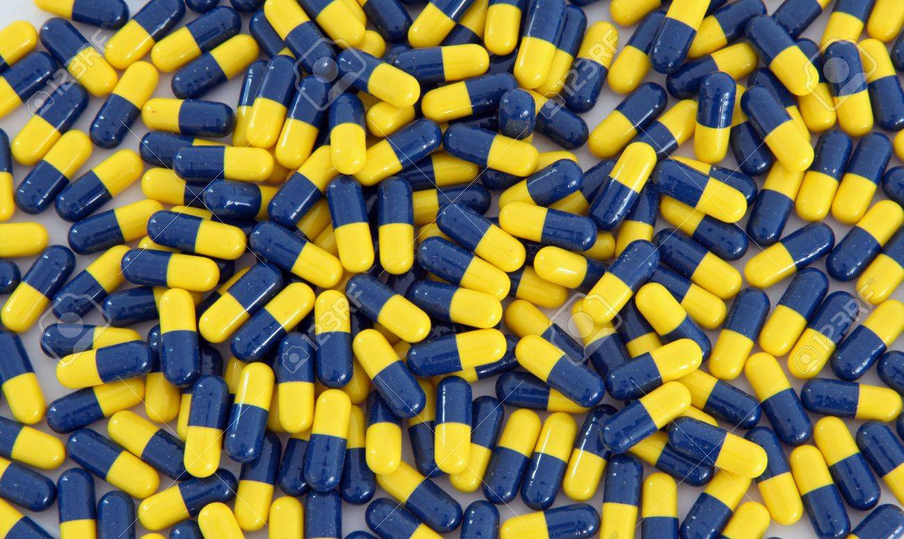 8257877-heap-of-blue-yellow-capsule-background-Stock-Photo.jpg