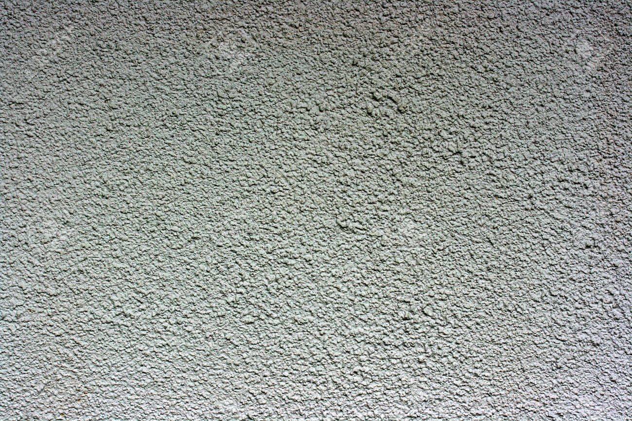 Il muro di casa è coperto da un edificio pelliccia dal cemento ...