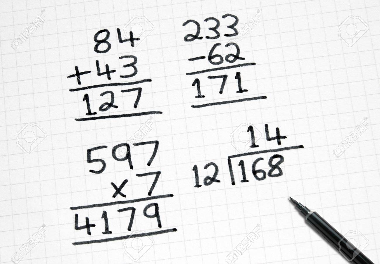 Worksheet Simple Maths Sums writing simple maths sums on square paper stock photo picture paper