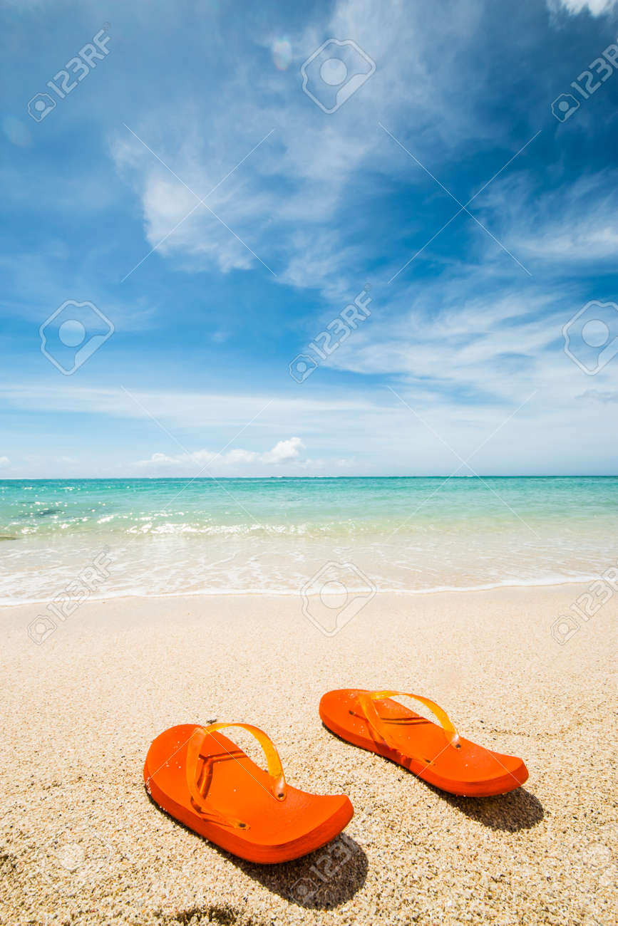flip flops in the sand