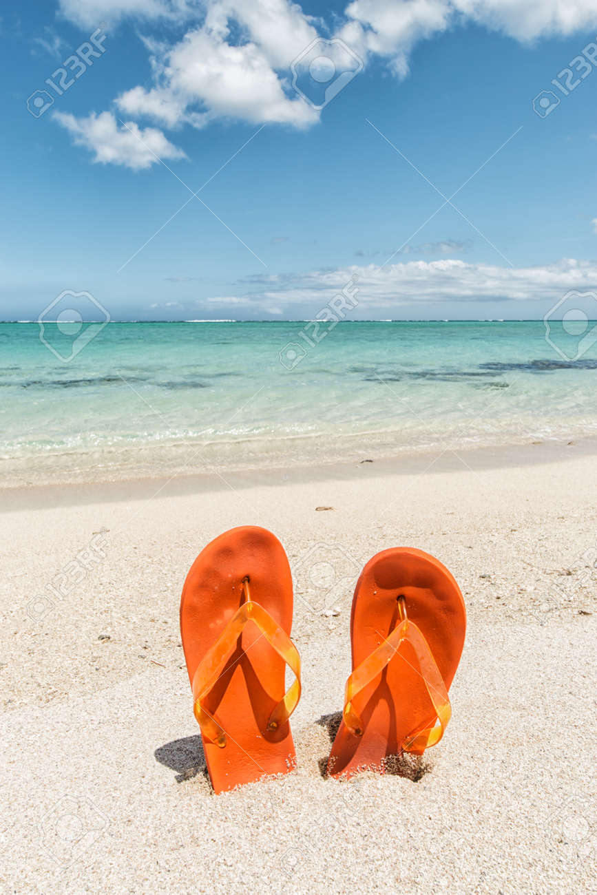 flip flops in the sand