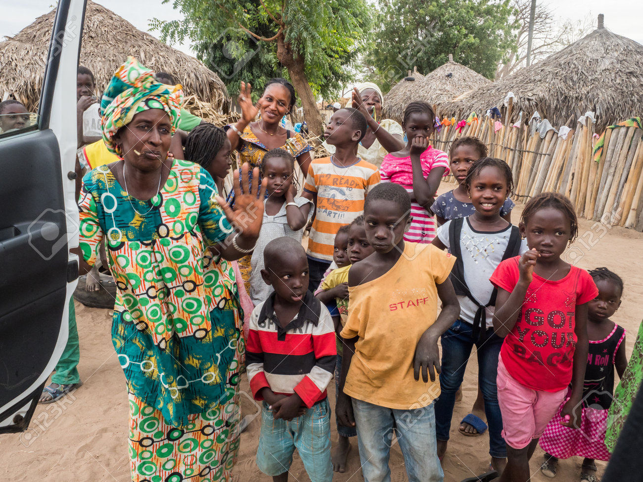 Senegal, Africa - January 2019: African Family In Traditional African Small  Village With Clay Houses Covered With Palm Leaves Stock Photo, Picture and  Royalty Free Image. Image 195079222., image size:1300x975