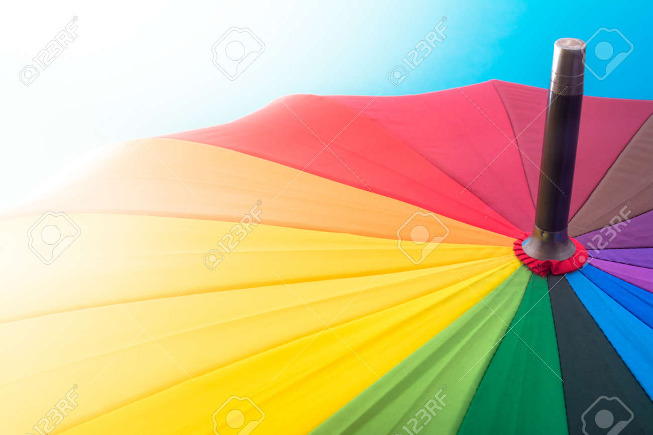multi colored colorful umbrella with all colors of the rainbow