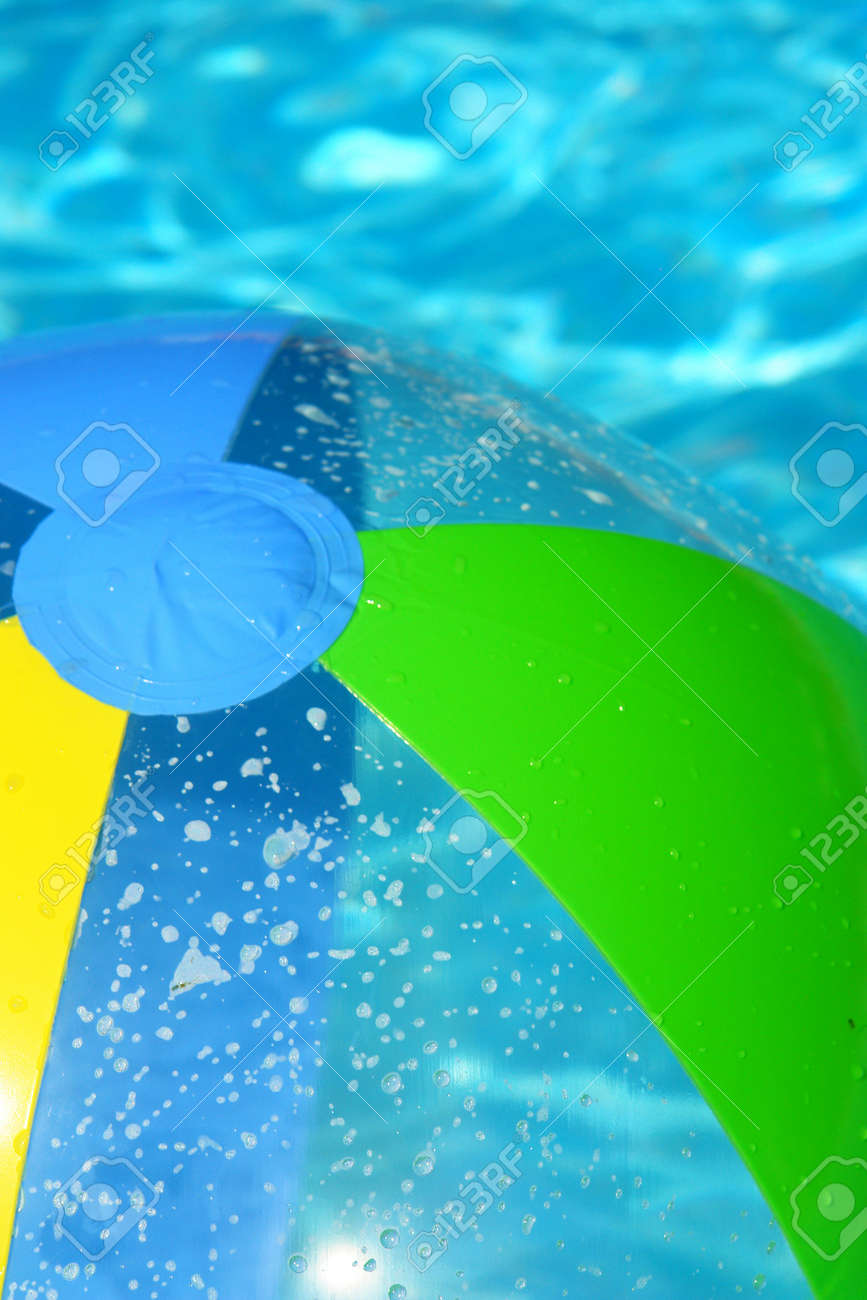 Pool Water With Beach Ball beach ball in the pool fresh water stock photo, picture and Pool Water With Beach Ball beach ball in the pool fresh water stock photo, picture and