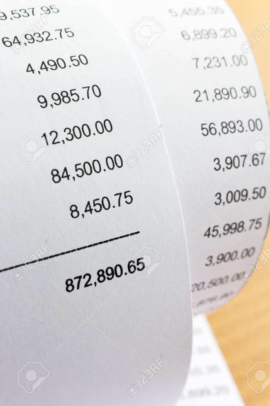 close up of receipt paper grocery shopping list stock photo