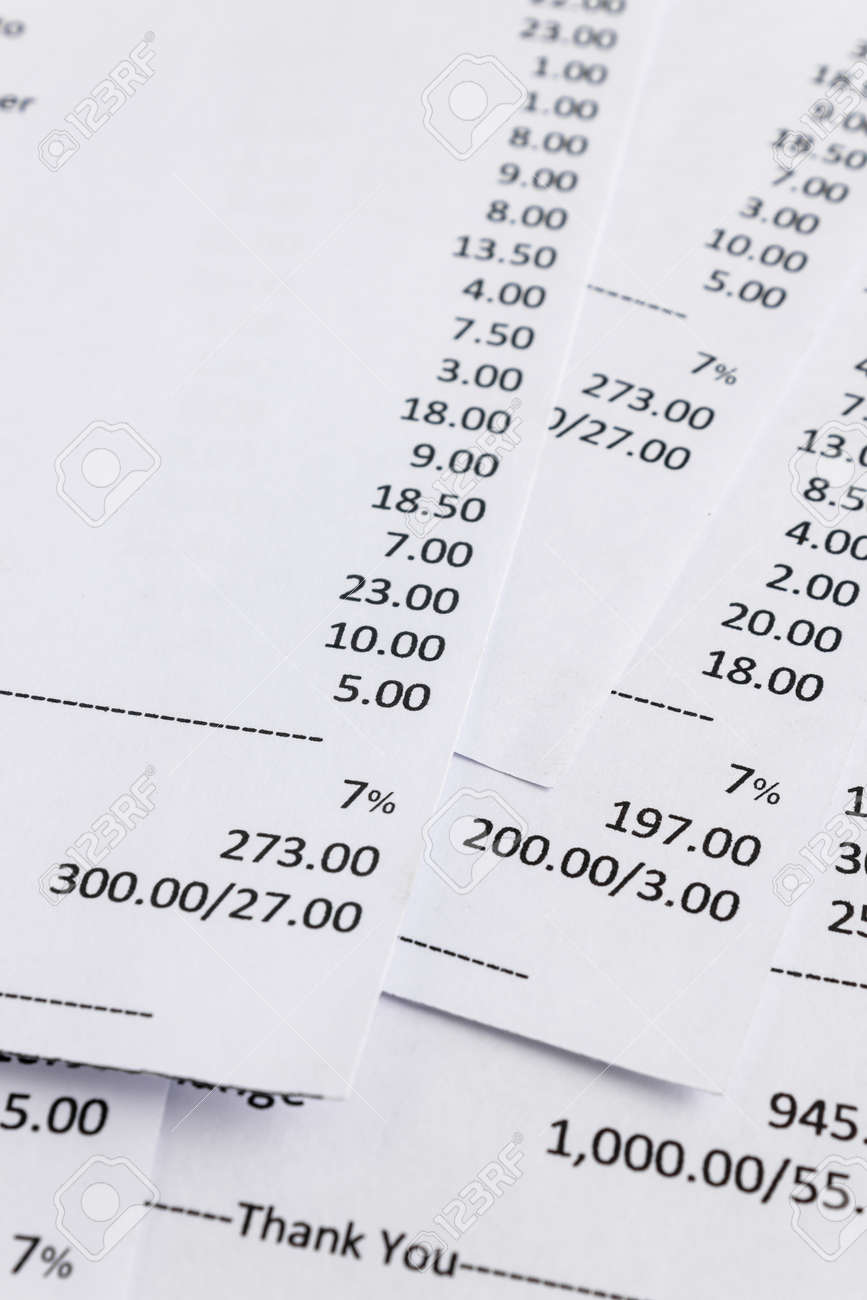 close up of receipt paper grocery shopping list stock photo