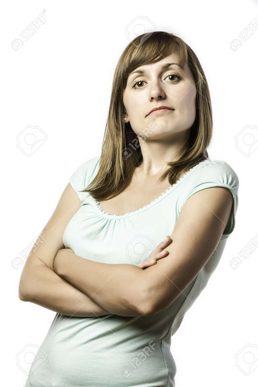 白の背景に分離された傲慢な顔で若いきれいな女性に立って の写真素材 画像素材 Image