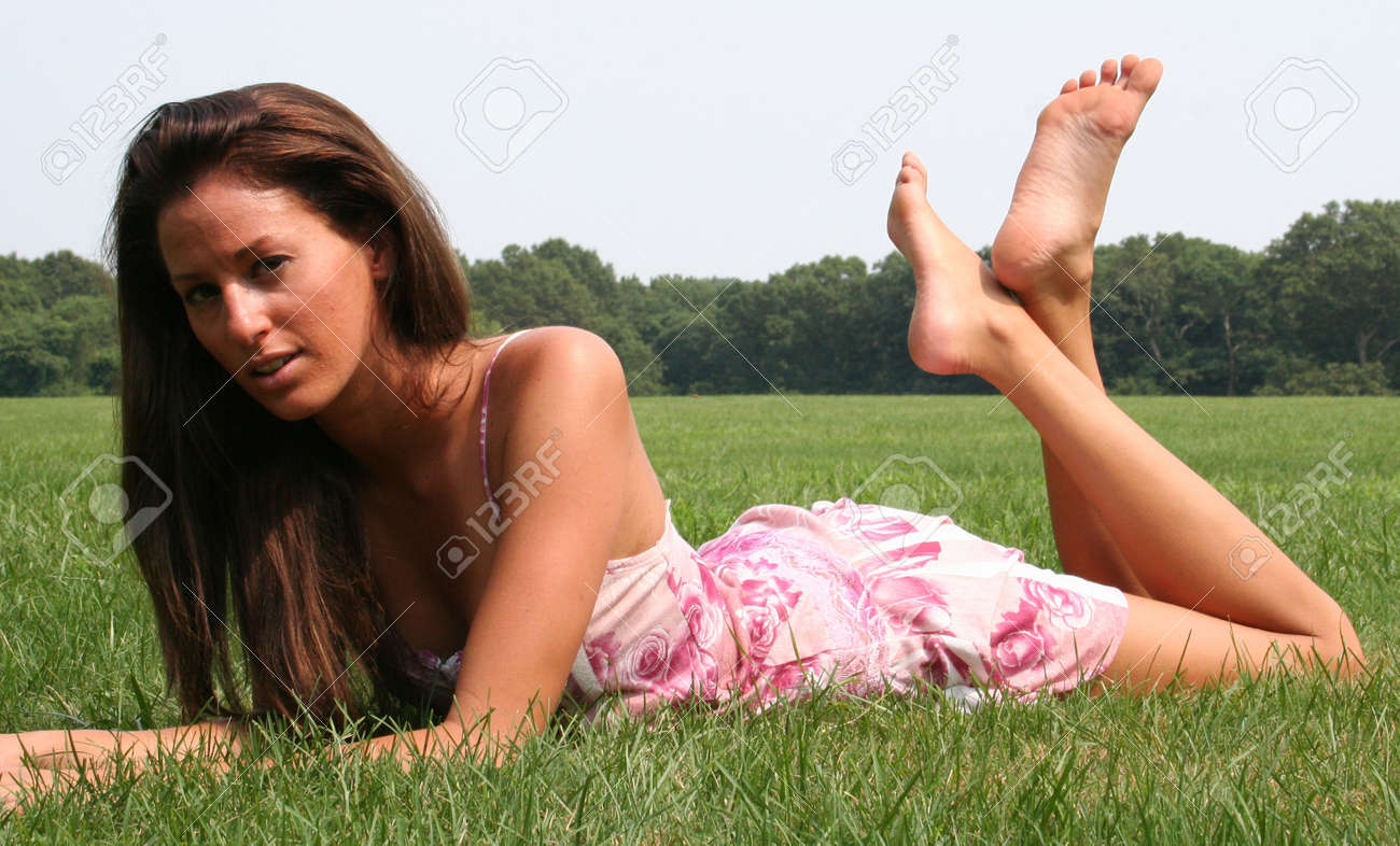 Barefoot Girl Relaxing In The Grass Stock Photo 3384298 Barefoot Girl Relaxing In The Grass Stock Photo 3384298