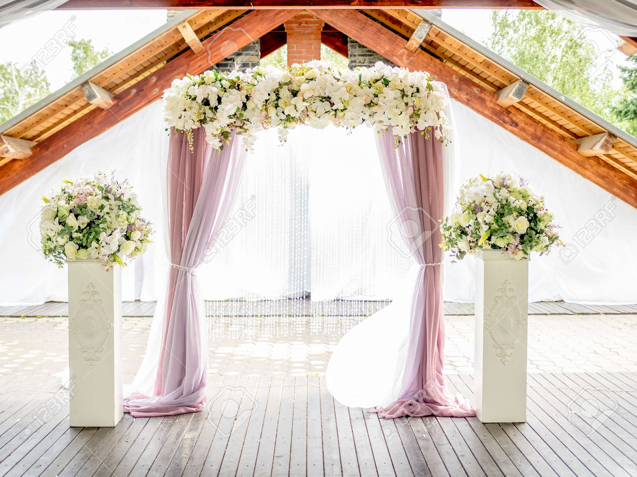 floral wedding arch of white roses and lillies ith purple with curtains - 54805276 floral wedding arch of white roses and lillies ith purple with curtains - 54805276
