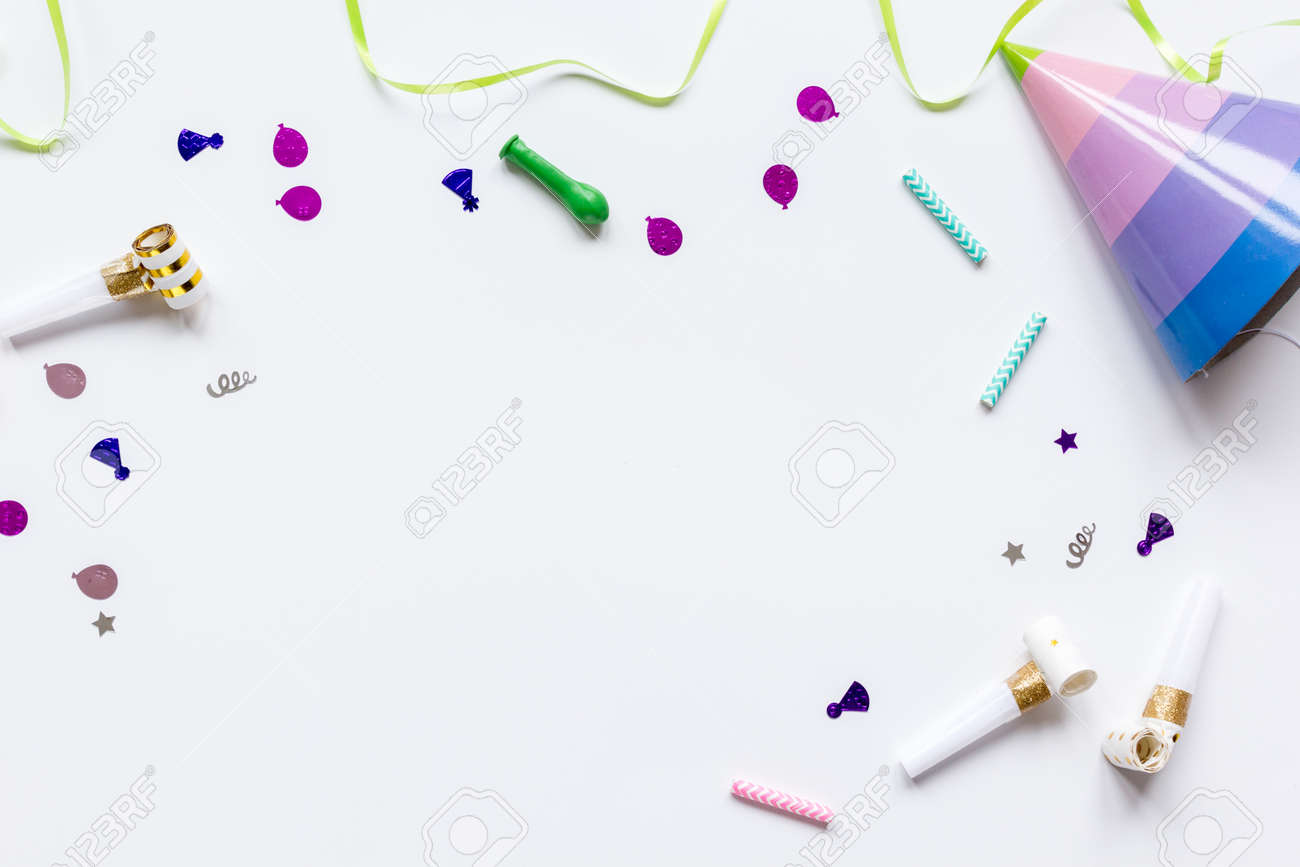 Download Colored Party Hat And Confetti On White Table Background Top View Mockup Stock Photo Picture And Royalty Free Image Image 75720783