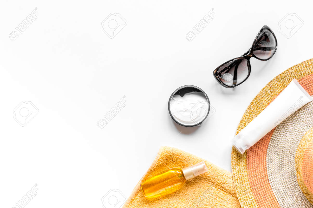 Sun glasses, protiction cream, hat, towel for beach rest white background top view mock-up - 81032175 Sun glasses, protiction cream, hat, towel for beach rest white background top view mock-up - 81032175